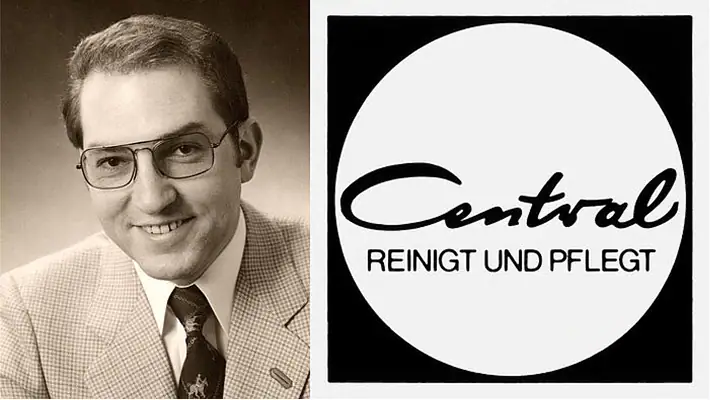 Mann in Anzug mit Brille neben Reinigungsfirma-Logo.