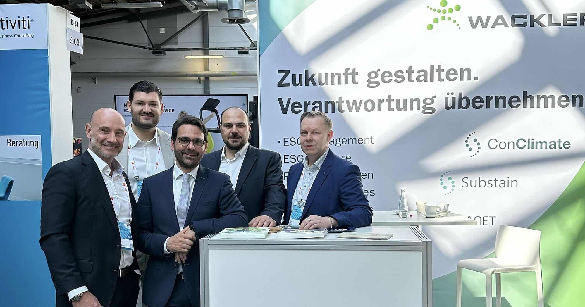 Geschäftsleute bei der Wackler Service Group auf dem Zukunftstag Mittelstand 2025.
